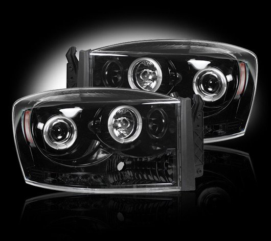 Part # 264199BK - SMOKED Projector Headlights Dodge RAM 06-08 w LED Halos & DRLs