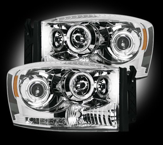 Part # 264199CL - CLEAR Projector Headlights Dodge RAM 06-08 w LED Halos & DRLs