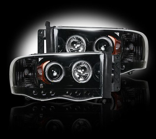 Part # 264191BK - SMOKED Projector Headlights Dodge RAM 02-05 w LED Halos & DRLs