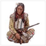 INDIAN CHIEF SITTING/PIPE