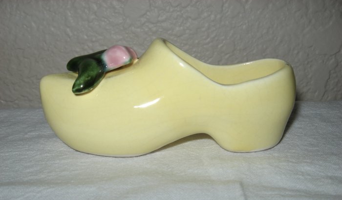 Yellow Dutch Ceramic Clog w/Flower. Can be used as a wall hanging.