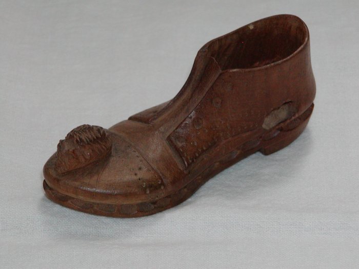 Man's Wooden Shoe with Mouse on Toe