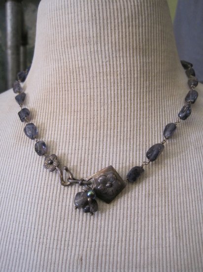Purple Iolite, Glass Beads, Swarovski Crystals all on Silver Links with Unique Flower Clasp