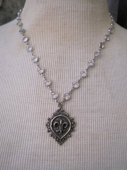 Silver Fleur De Lis Shield Pendant on Silver Wrapped Crystal Chain Necklace