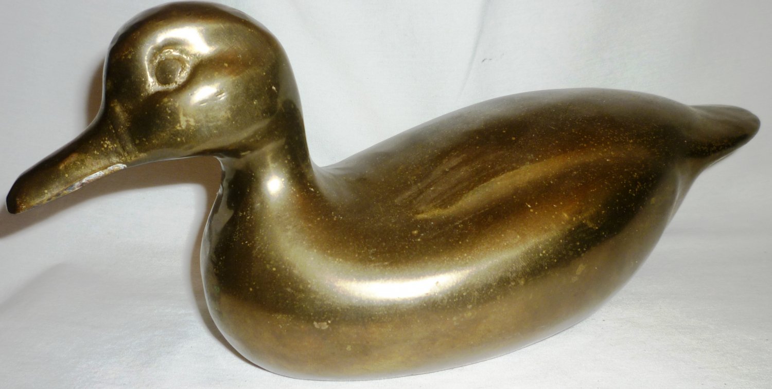 solid brass duck figurines