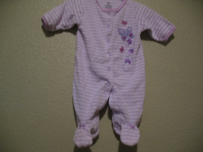 Newborn girls purple sleep and play