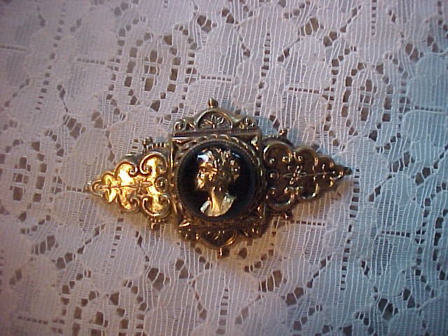 vintage cameo set in bubble glass
