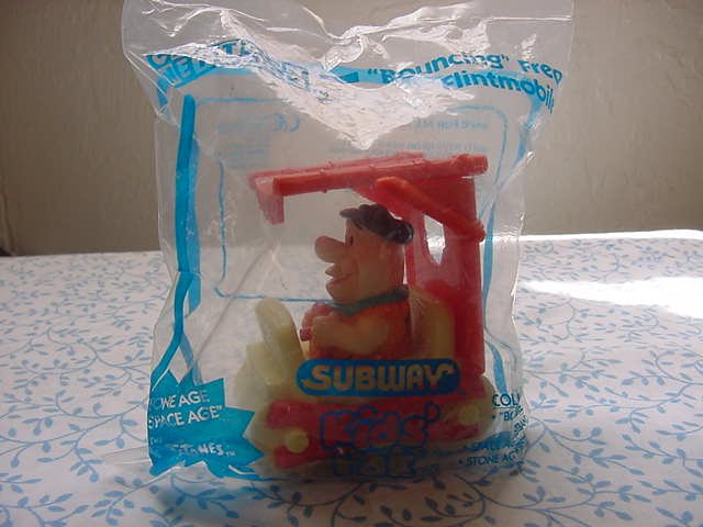 Subway Fred Flintstone Bouncing Flintmobile Car MIP