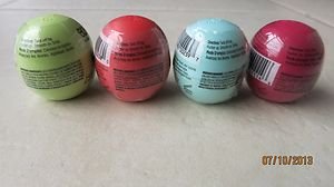 4 EOS Lip Balms Pomegranate raspberry Summer Fruit Sweet mint Honeysuckle honeyd