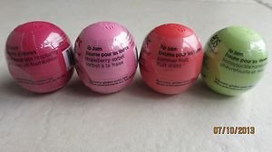 4 EOS Lip Balms Pomegranate raspberry Summer Fruit Strawberry sorbet Honeysuckle