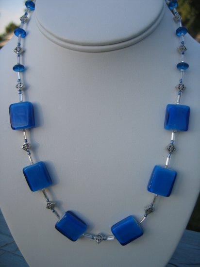 Bright Blue Glass and silver accents