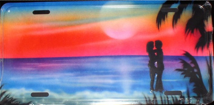 AIR BRUSHED MAN AND WOMAN ON BEACH LICENSE PLATES