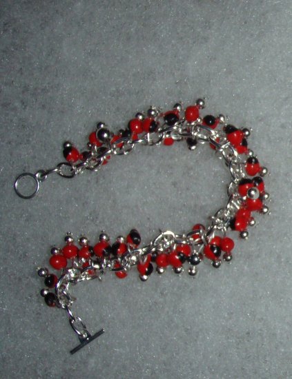 Silver .950 Peruvian Bracelet with Huayruro Seeds