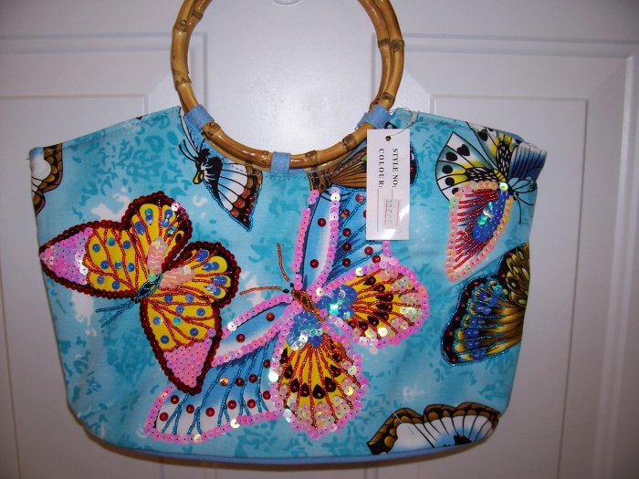 NWT BLUE HAND BAG WITH HAND SEWN BEADED BUTTERFLIES