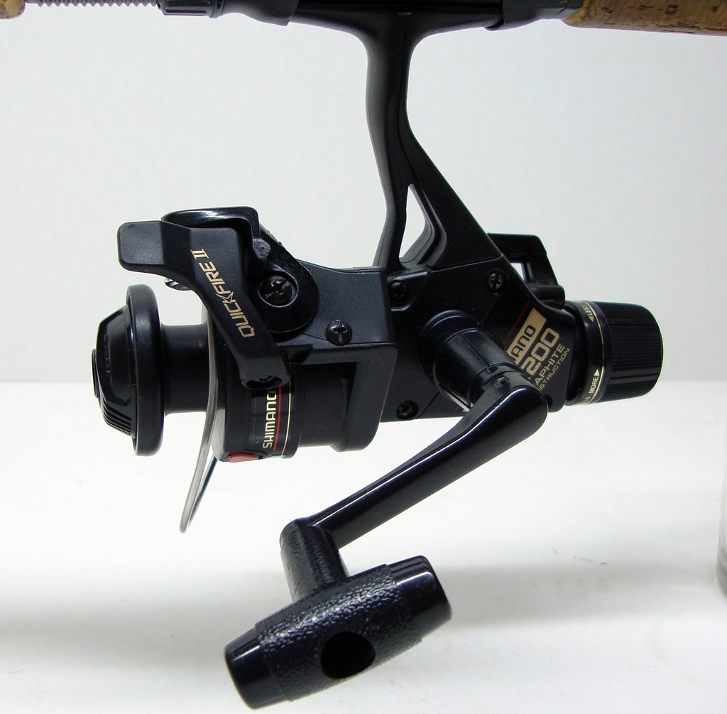 Shimano FX200 QuickFire2 Fishing Reel ( very clean)