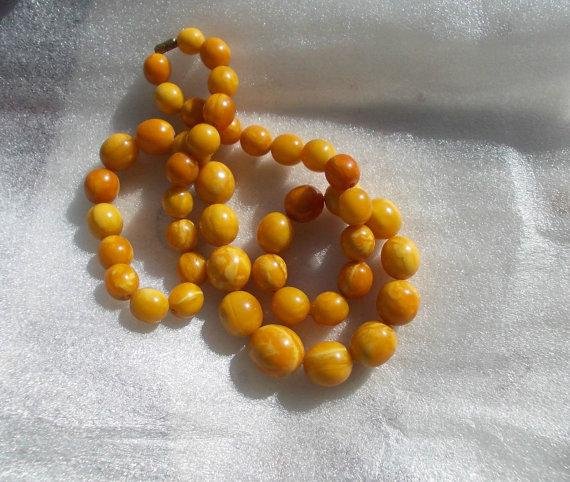 Egg yolk Baltic amber 27 in necklace, 80 gr