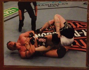 Former UFC MMA Champ FRANK MIR kneebars Brock autographed signed 8x10 photo