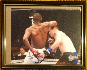 UFC Champ JON "BONES" JONES SPINNING ELBOW on O'Brien framed 8x10 photo