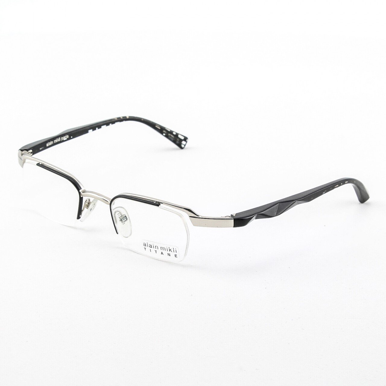 Alain Mikli Eyeglasses AL0556 Col. 8 Silver and Black Frame with Black Geometric Temples