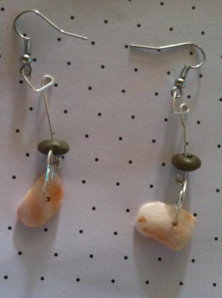Shell earrings with wooden bead accents.