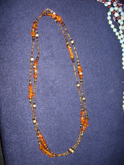 Beautiful amber looking stones and gold-like spacers