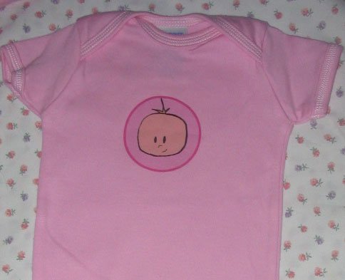 girl short sleeve romper available in sizes 6-18months