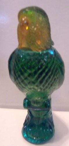 Avon Island Parakeet filled with 1.5 fl oz. of Moonwind Cologne