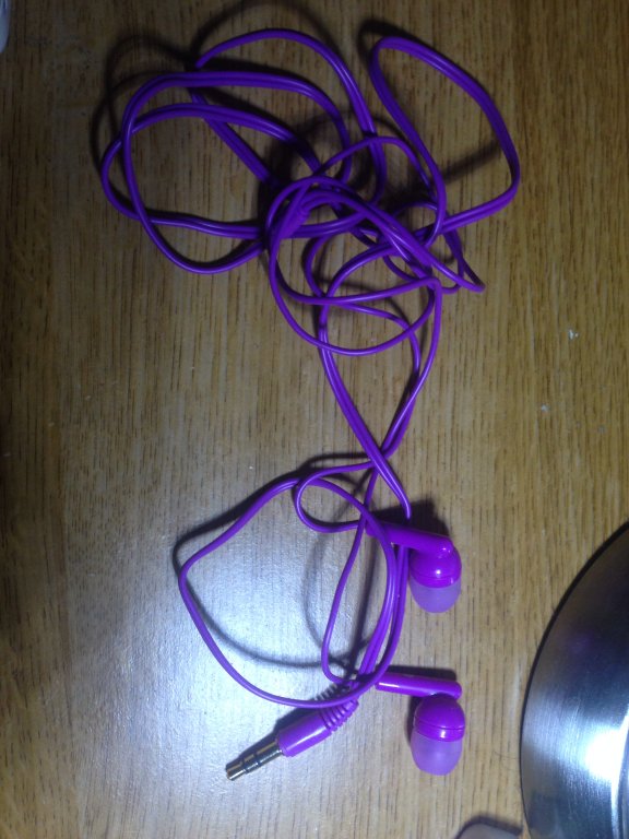 purple ear bud headphones