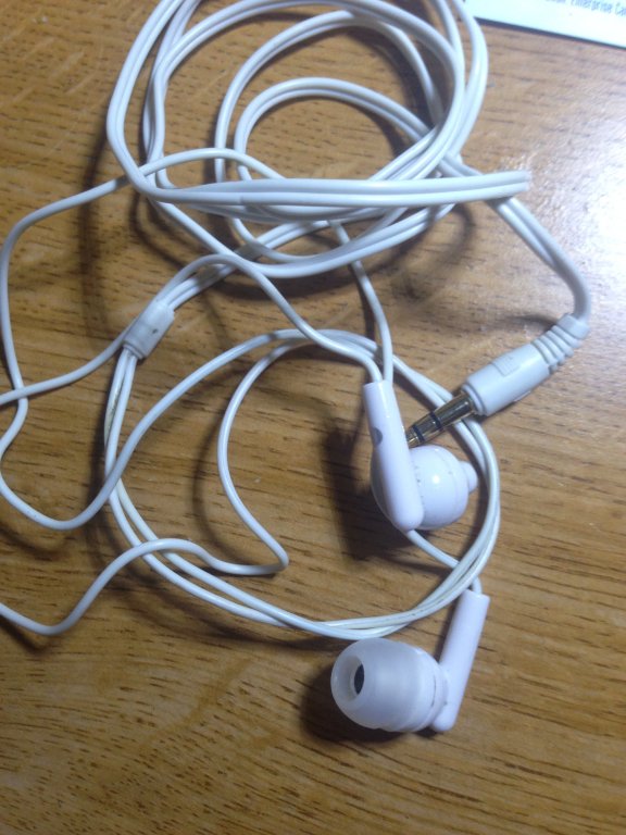 white ear bud headphones new