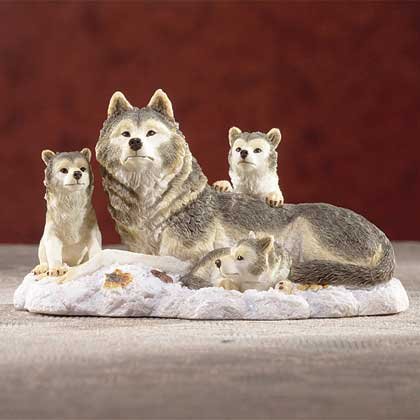 Wolf Family On Snow