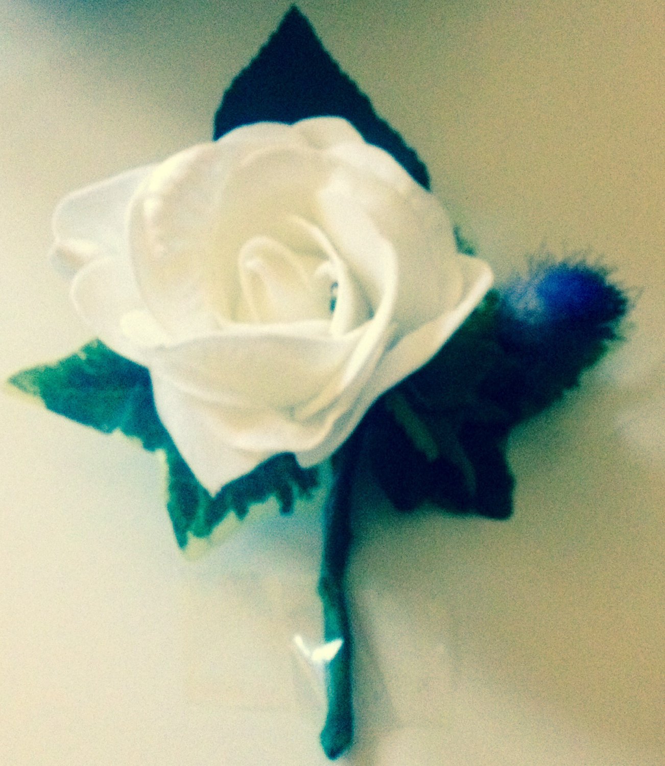Artificial gents buttonhole Rose and Thistle.