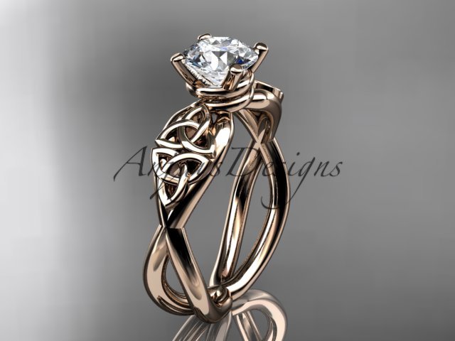 14kt rose gold celtic trinity knot engagement ring with a Moissanite center stone CT770