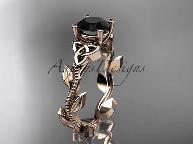 14kt rose gold celtic trinity knot wedding ring with a Black Diamond center stone CT7238