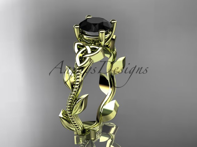 14kt yellow gold celtic trinity knot wedding ring with a Black Diamond center stone CT7238