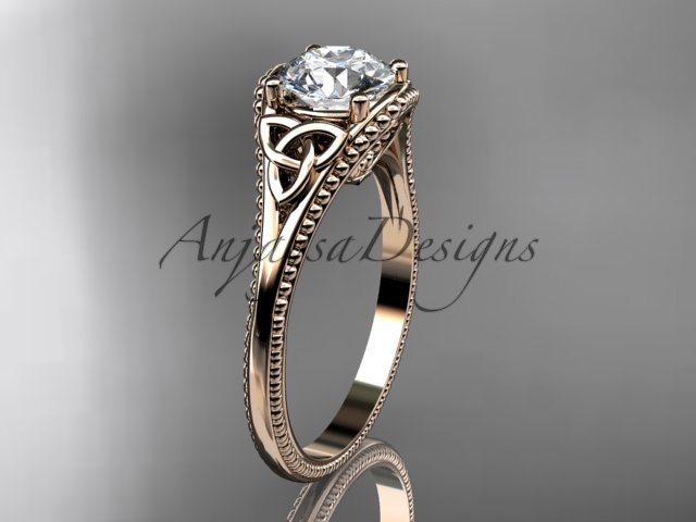 14kt rose gold celtic trinity knot engagement ring with a Moissanite center stone CT7375