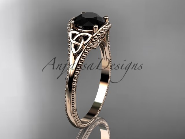 14kt rose gold celtic trinity knot engagement ring with a Black Diamond center stone CT7375