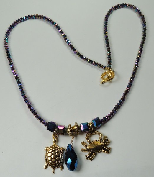 Seaside Purple Crystal Necklace with Metal Gold Tone Crab and Turtle Charm