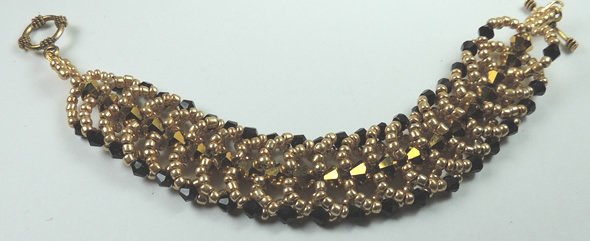handcrafted Gold and Black Crystal and Seed Bead Bracelet