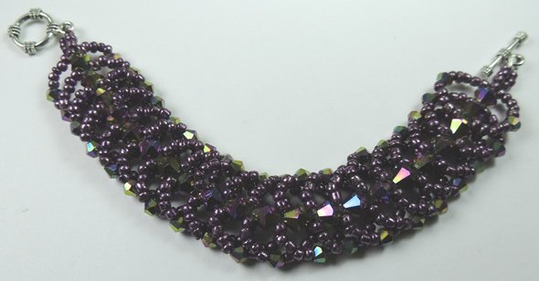 handcrafted Purple Crystal and Seed Bead Bracelet