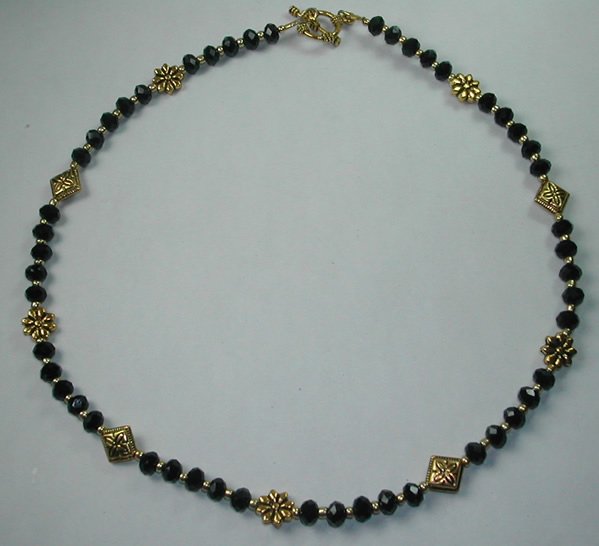 handcrafted Black Crystal Necklace with Gold Plated Flowers