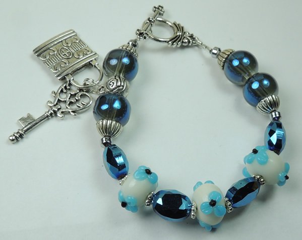 White & Blue Floral Lampwork Bracelet with Metal Plated Silver Tone Key & Lock Charms