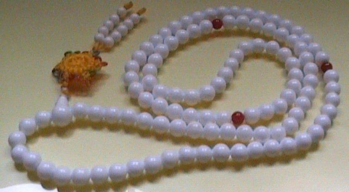 sea shell chanting beads. string of 108