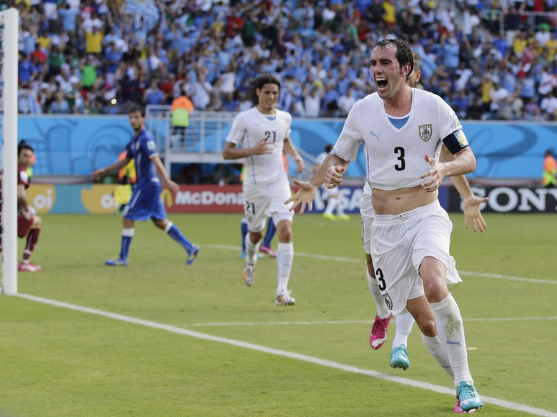 057 - 8 X 6 Photo - Football - FIFA World Cup 2014 - Italy V Uruguay Diego Godin Celebrates