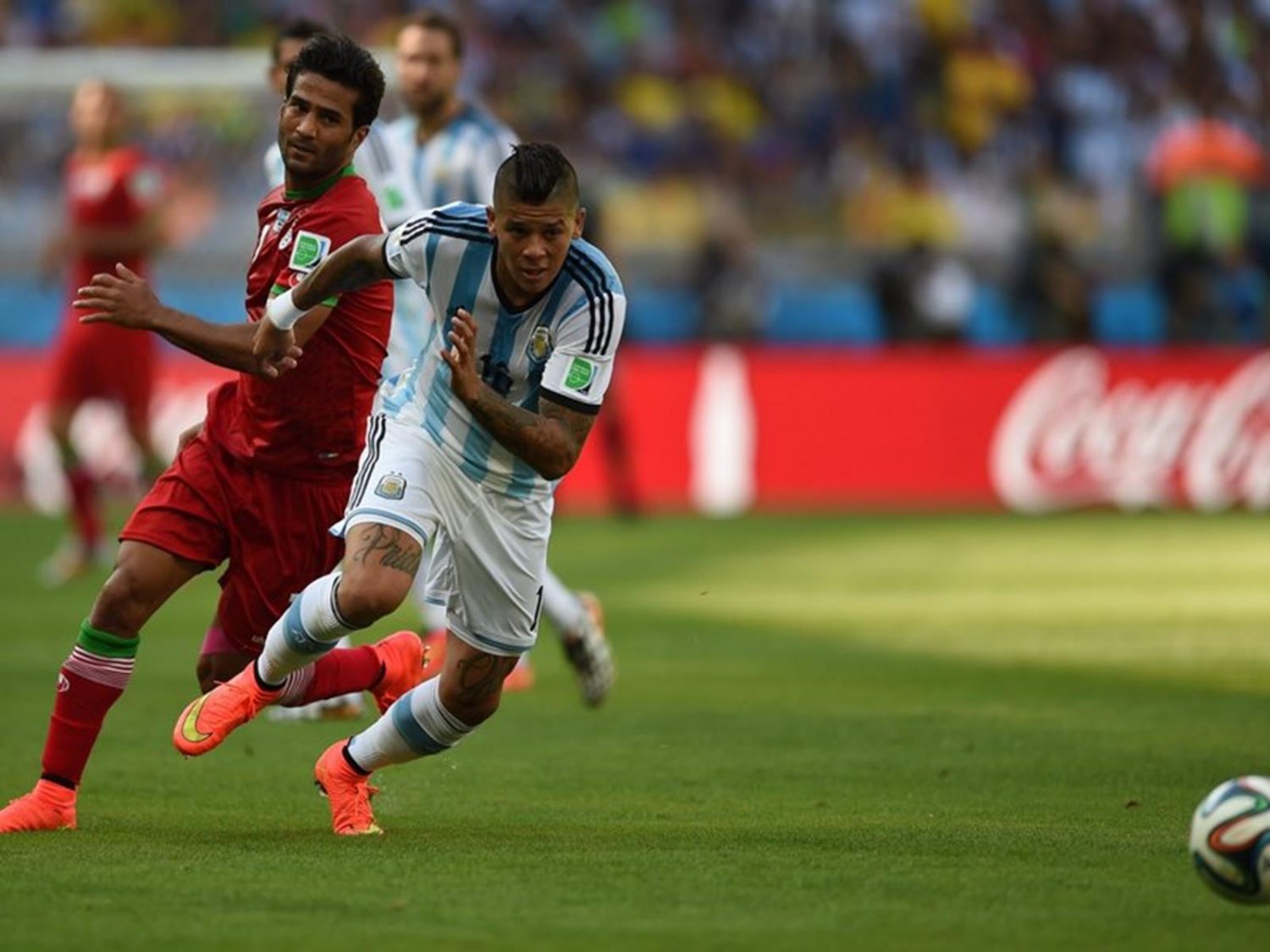 114 - 8 X 6 Photo - Football - FIFA World Cup 2014 - Argentina V Iran - Marcos Rojo & Masoud Shojaei