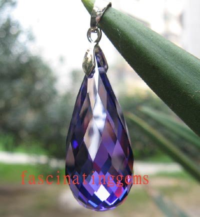 IF~40.25CT BRILLIANT FUNNELED BLUE ZIRCON PENDANT