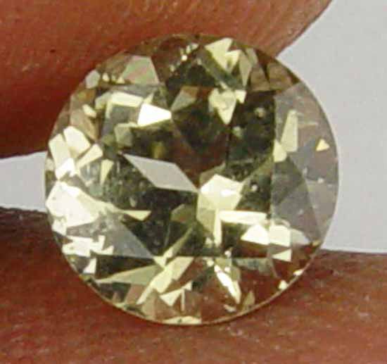 1.05CT Rare Round Cut Super Glow Kornerupine 10090110