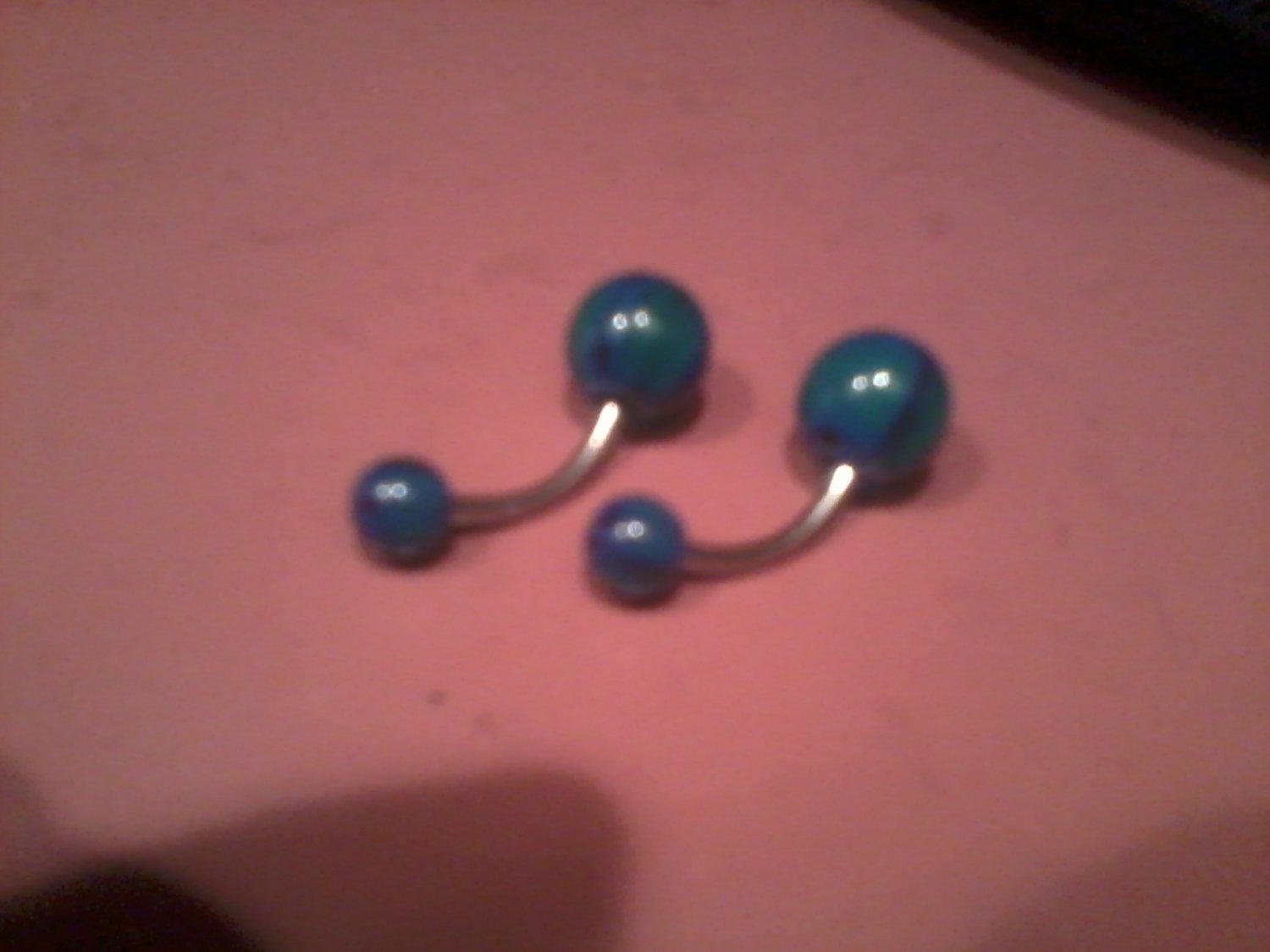 blue and green skeleton belly button ring