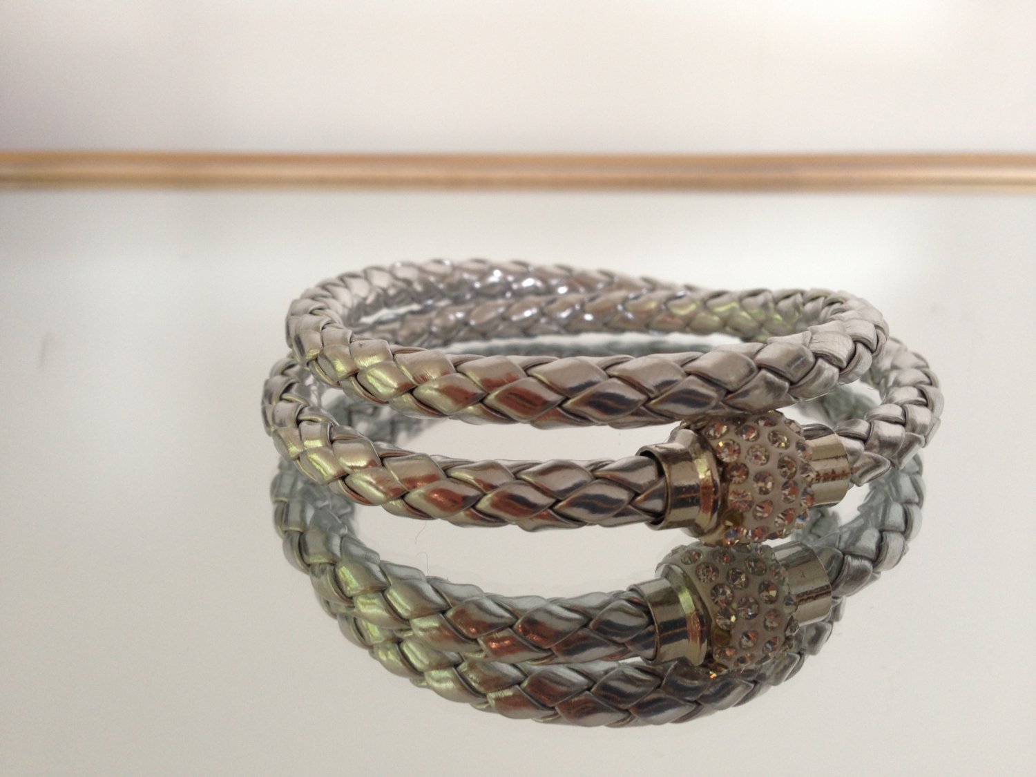 Braided Bracelet With Charm Closure