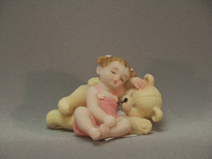 Sleepy Baby on Teddy Bear