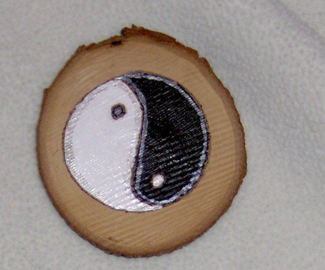 Handmade Yin Yang wood chip magnet woodburned and handpainted with silver accents